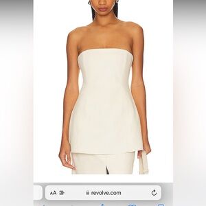 Never worn!! We wore what - white leather tube top size 8